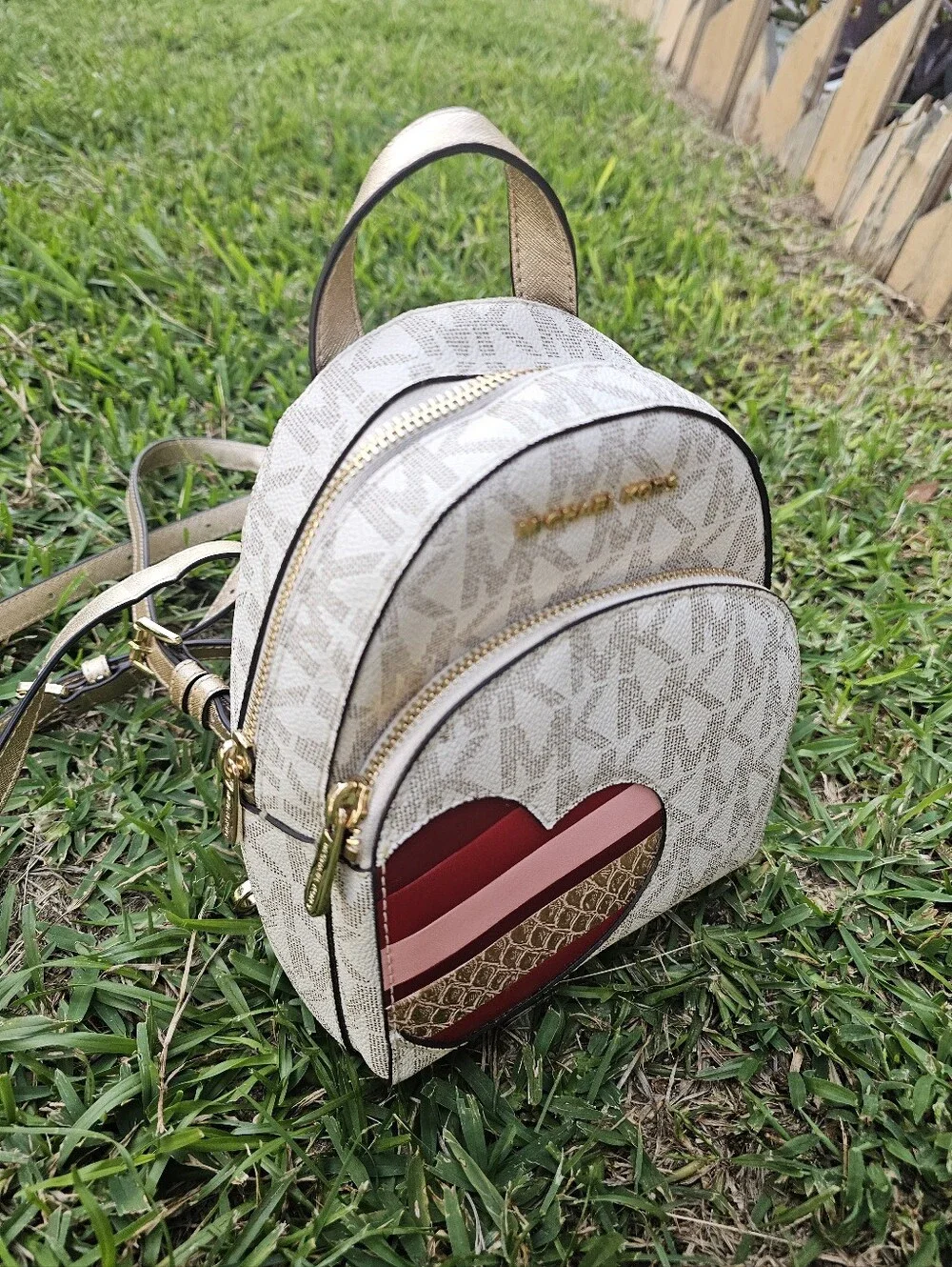 Michael Kors Mini Beige Logo Mini Backpack with Red Heart Accent